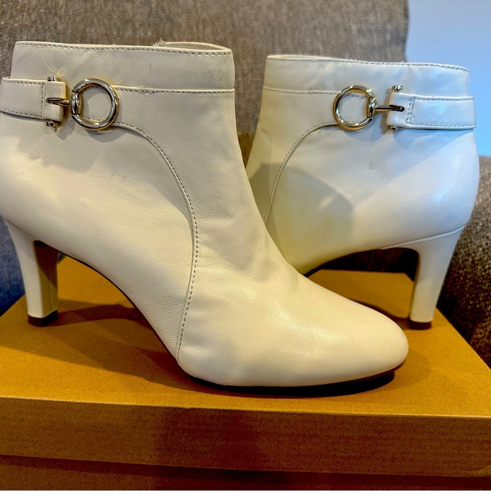 White leather ankle booties